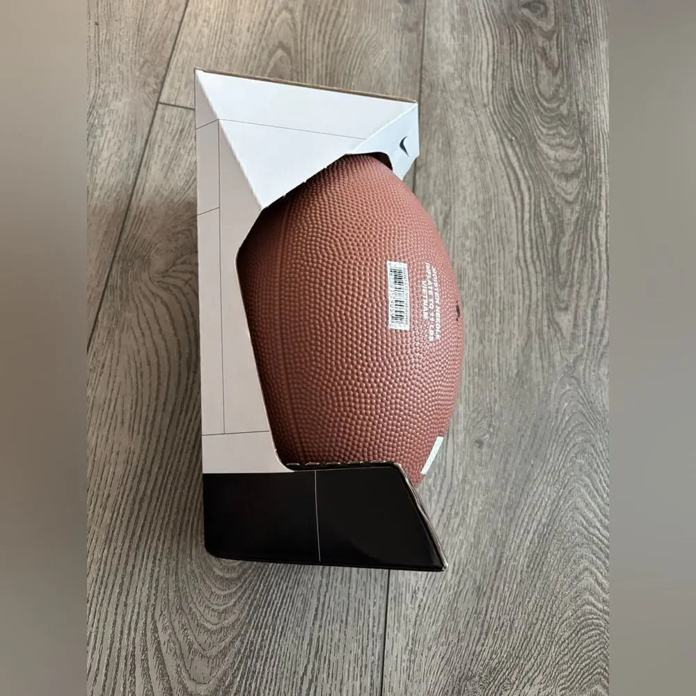 Nike brown and white Precision Football